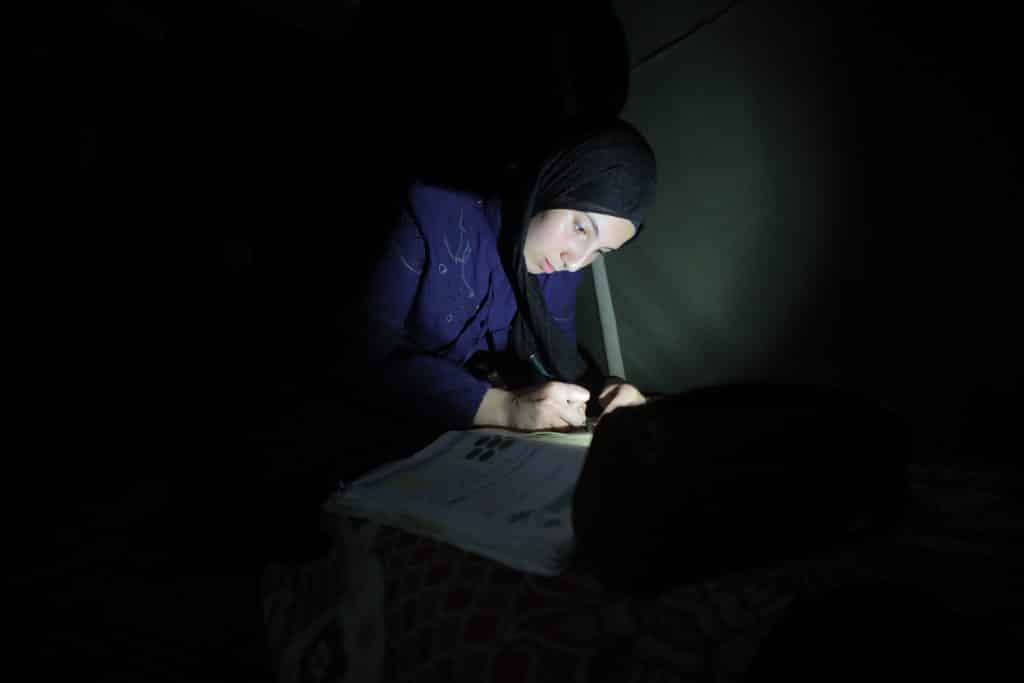 Studying for high school finals in Gaza without electricity, adequate food, or a home