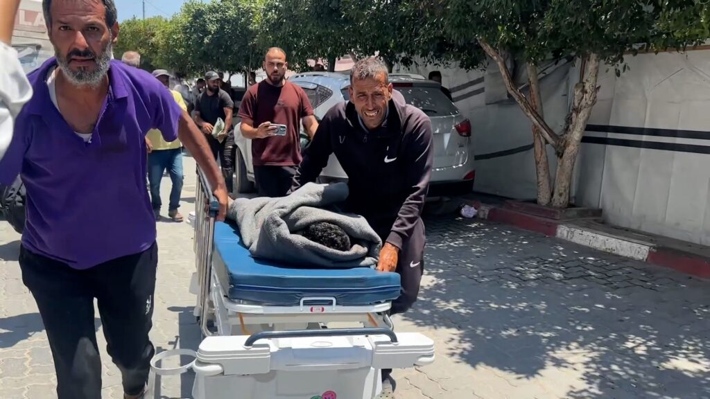 Palestinian boy amongst dead in Israeli strike on displaced tent in Gaza