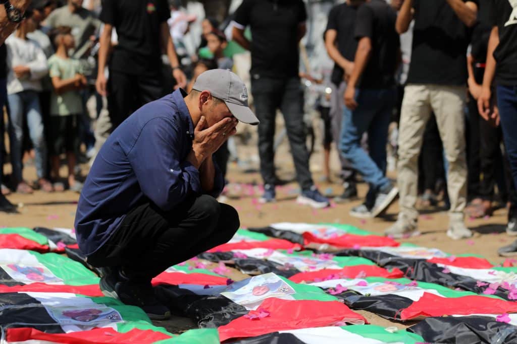 ‘Our grief has returned with the same intensity’: Gaza holds a mass funeral for the recovered remains of 112 family…