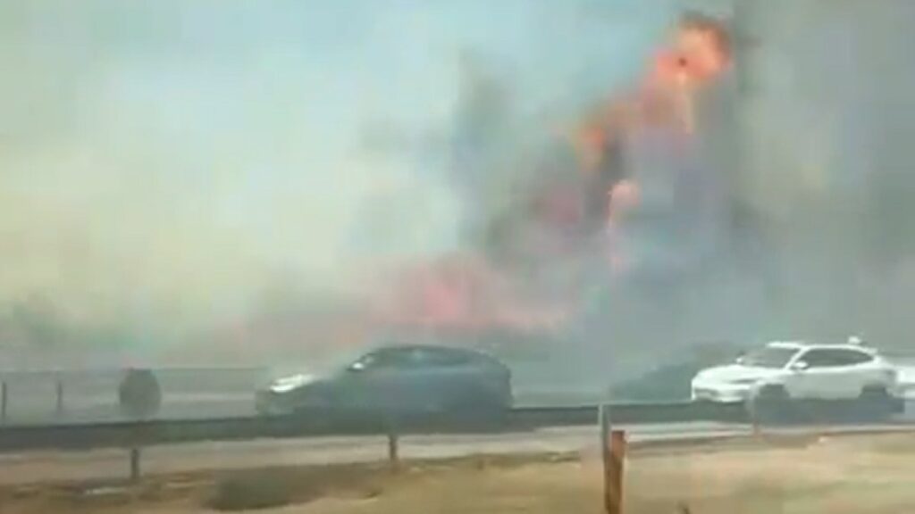 Crews battle wildfire that shut down major highways in Israel